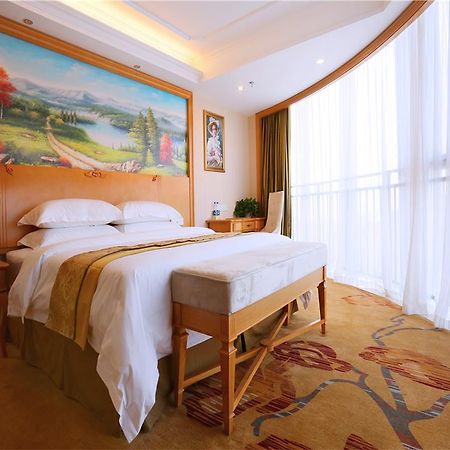 Vienna International Hotel Yantai Changjiang Road Xingyi Square Branch Exterior foto